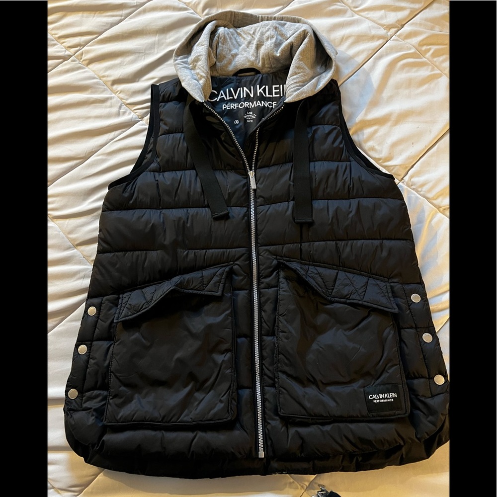 Calvin Klein performance vest with hood. Brand new without tags.